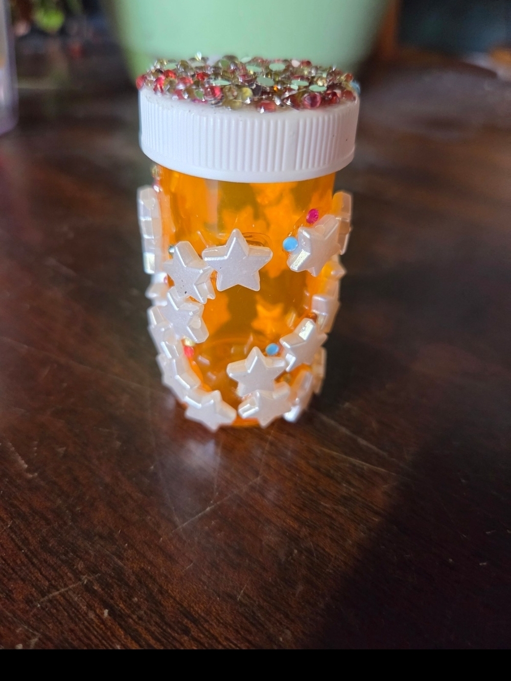 Bedazzled star beads pill bottle custom design. Small bottle #8 size
